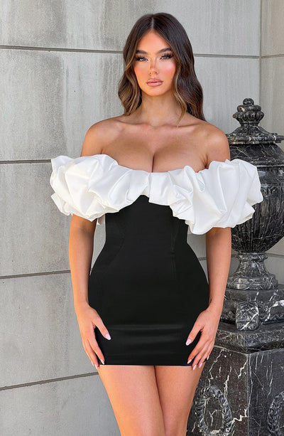 black white short dress Delta Mini Charlie Suede Seamed bodice with a dainty keyhole cutout at the center and a fitted waist sits atop a figure Retro Black And White Short